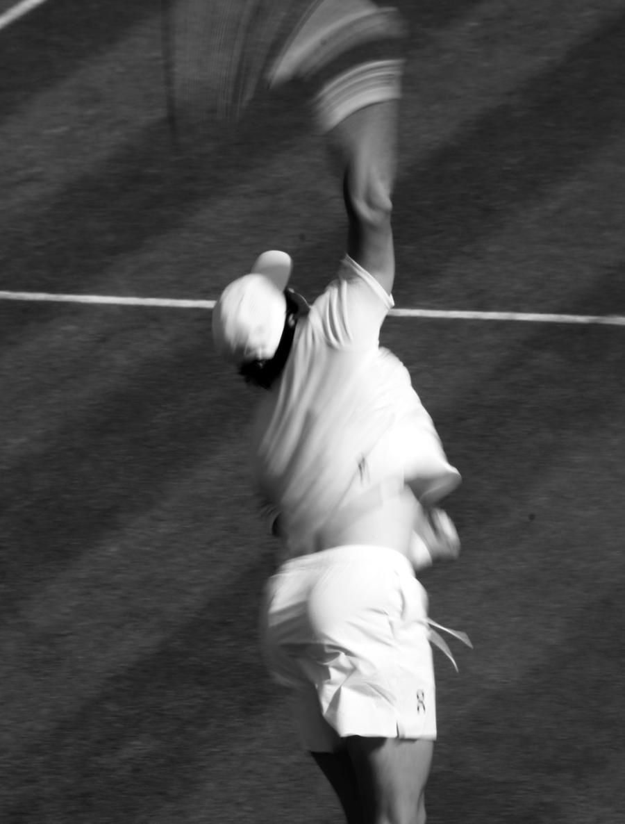 An athlete at full stretch, caught mid movement