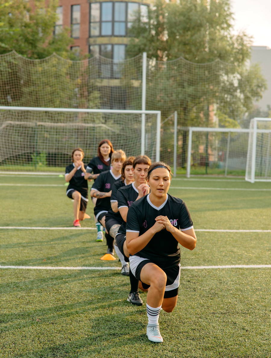 A training group working through a session at dusk